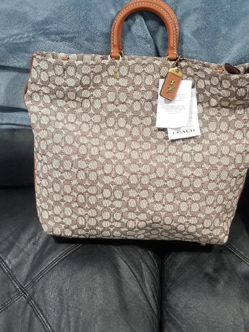 Coach Signature Canvas Tote in Brown and Tan with Leather Handles